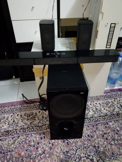 Sony sound system . sound bar, 2 speekers and woofer wth bluetooth