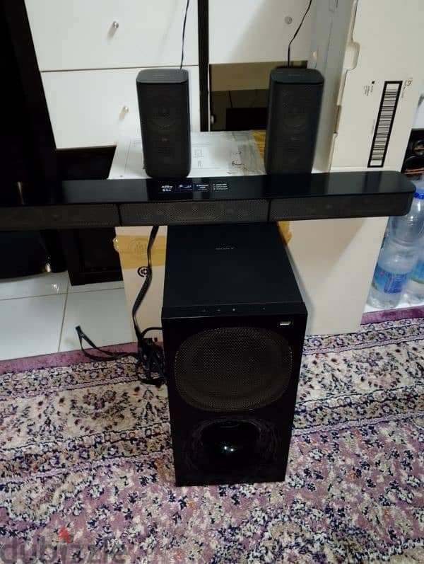 Sony sound system . sound bar, 2 speekers and woofer wth bluetooth 0