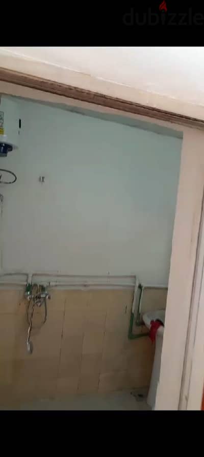 Room for rent in al hail south including water and electricity WiFi