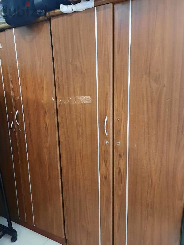 2 double door cupboards in mint condition only handle little damaged 2