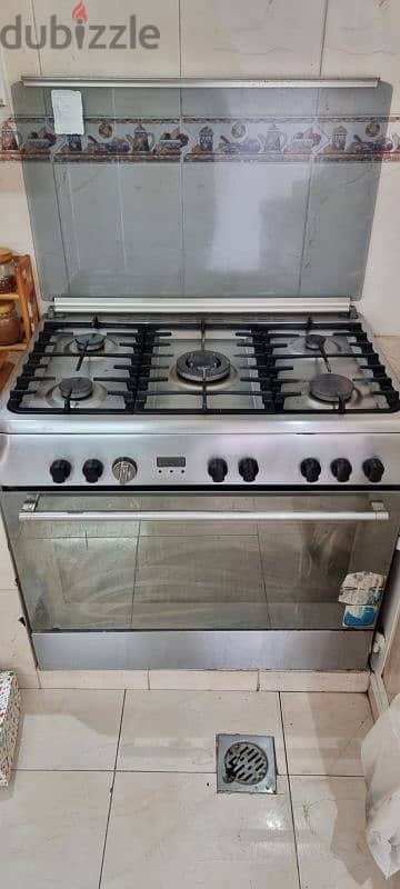 large full size 5 burners plus full-size oven great barely used 1