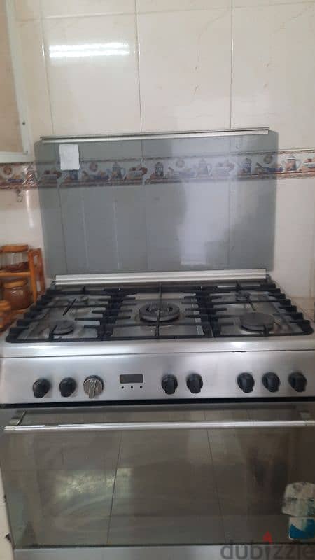 large full size 5 burners plus full-size oven great barely used 9