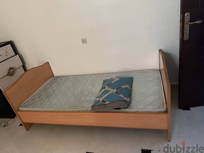 wooden bed and mattress 0