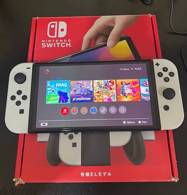 Nintendo switch OLED + 2 Games 1