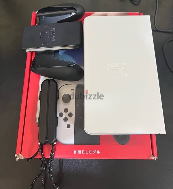 Nintendo switch OLED + 2 Games 4