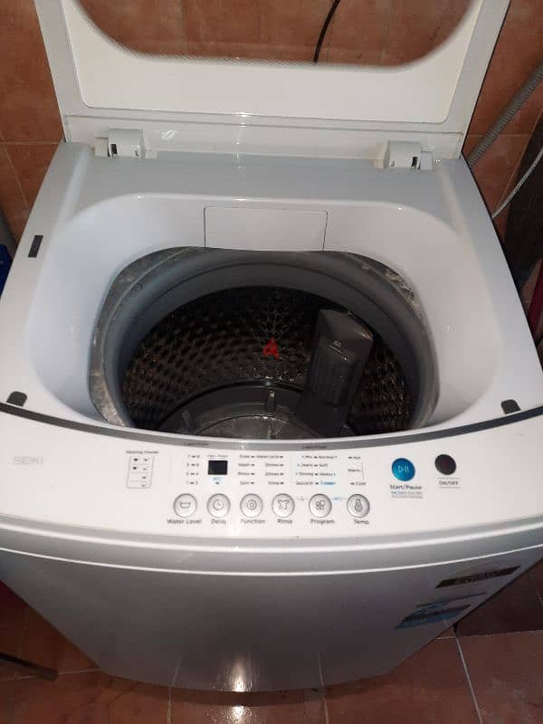 Almost new washing machine barely used urgent sale 4