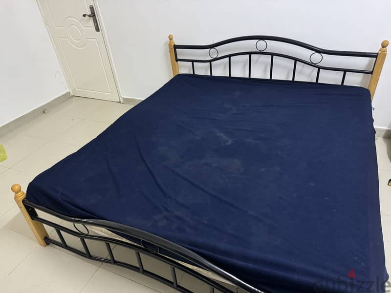 Used metal king size bed without mattress 1