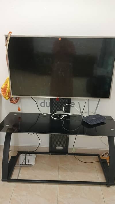 LG 49 Inch smart TV with magic remote and tv table