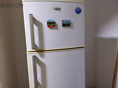 14 yrs old . whirlpool fridge double door