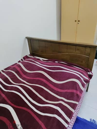 bed with wooden cupboard for sale