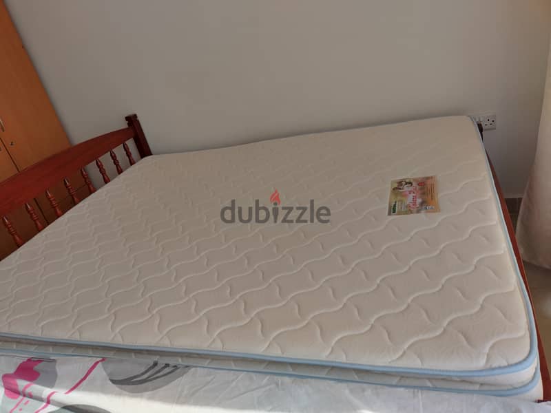 9 month old Mattress plus 10 yrs old cot 1