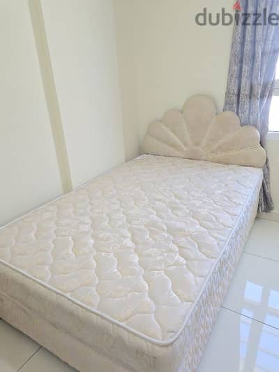 Bed with mattress