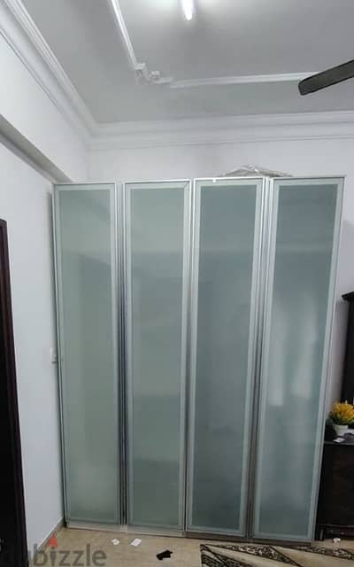 Four door cupboards