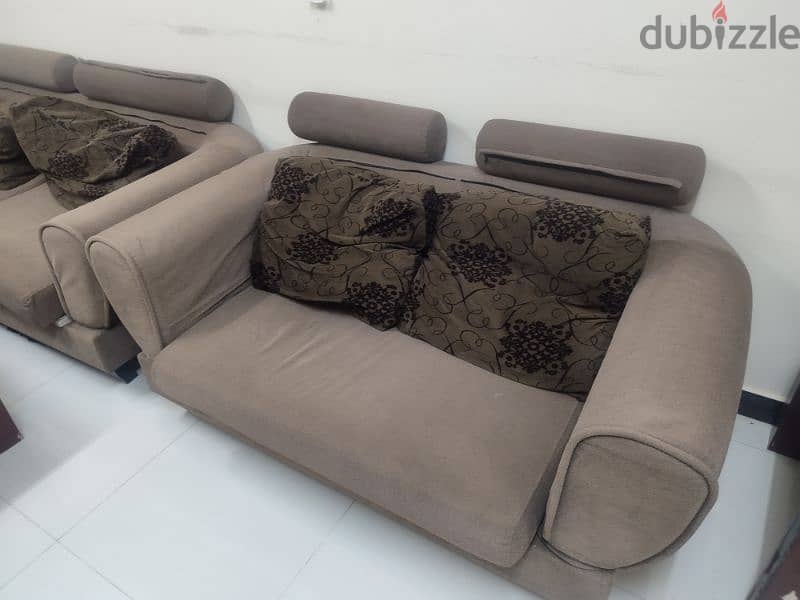 sofa set with 2 tables and bed and cupboards 3