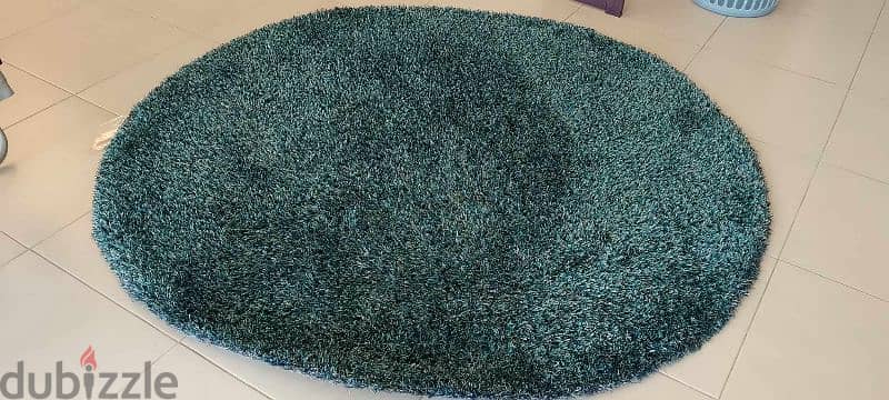 round ml blueish carpet 0