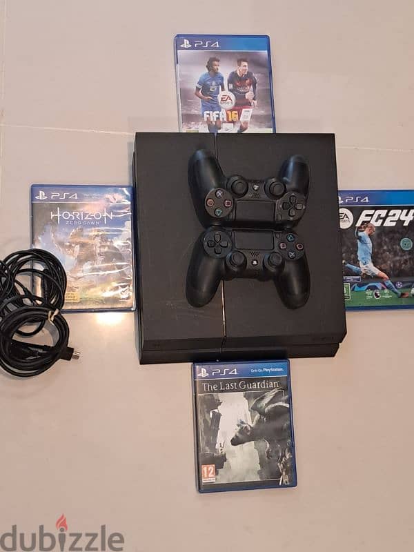 Play Station 4 1TB hard drive with 4 games and 2 controllers 0