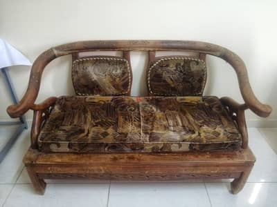 Wooden sofa with metal table