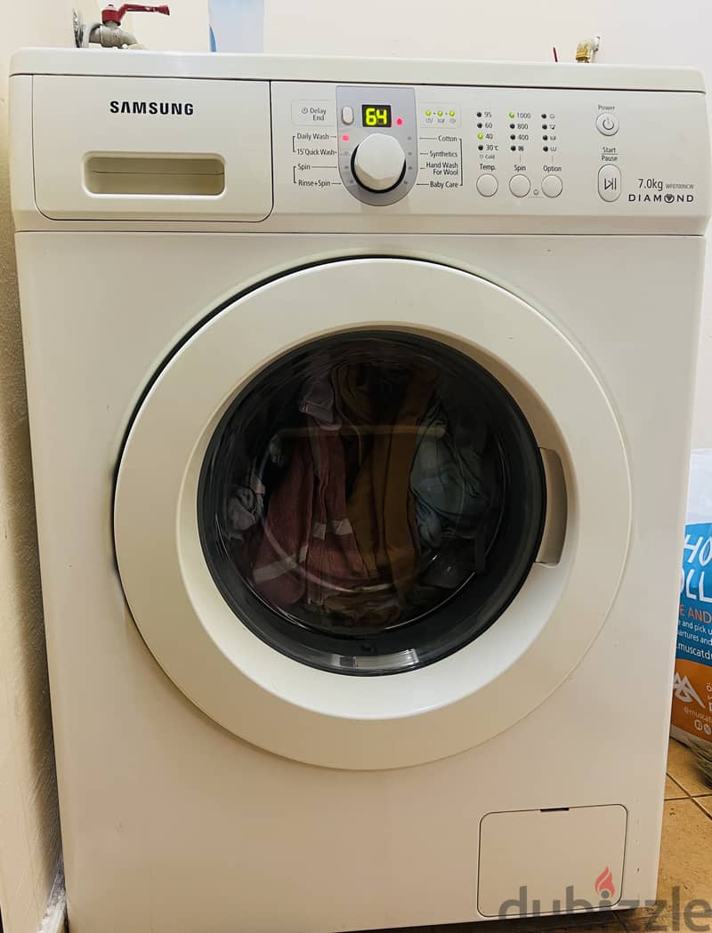 Washing machine (Samsung) at 35 Omr 0