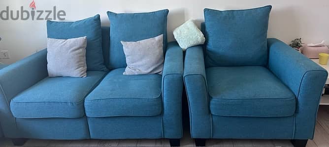 beautiful blue sofa set with cozy cushion