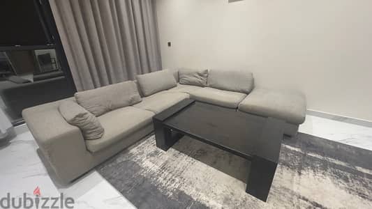 L shape sofa and table