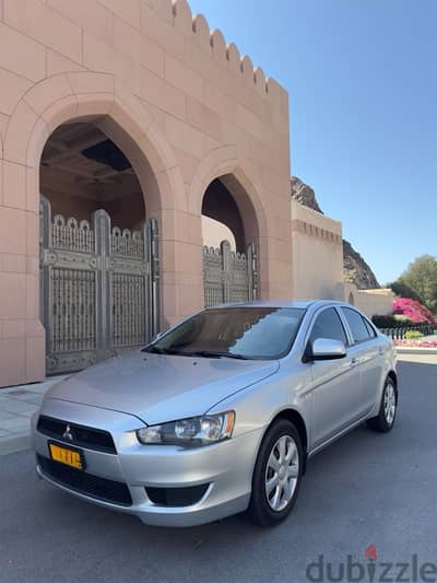 Mitsubishi Lancer 2014  Oman lady used very clean car