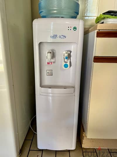 Used hot and cold dispenser from Oasis for immediate sale