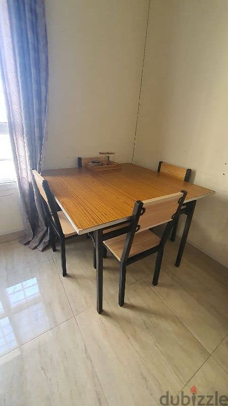 Folding type dining table with four chairs 1