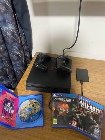 Sony PS4  in excellent condition- 2TB HDD with 1 controller and games