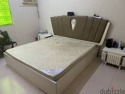 king size bed with 2 sides table and mattress