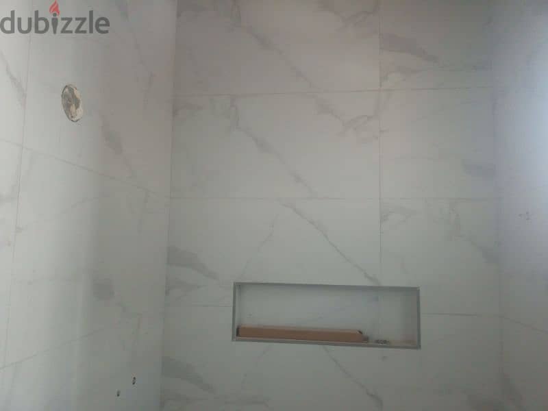 tile mason،home maintenance swimming pool interlock Karbonn stone haz 1