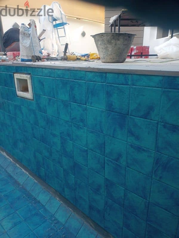 tile mason،home maintenance swimming pool interlock Karbonn stone haz 2