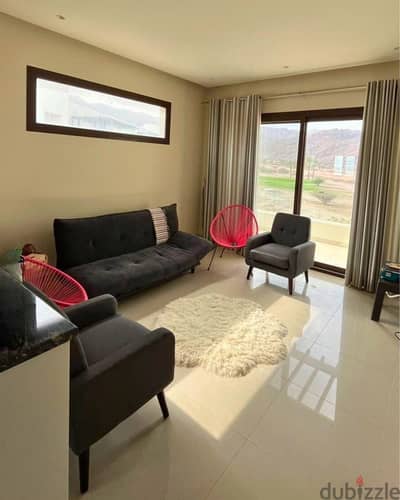 Elegant Furnished 1-Bedroom Apartment for Sale in Jebel Sifah