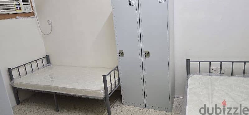 Bed space and room for rent ruwi . indians 1