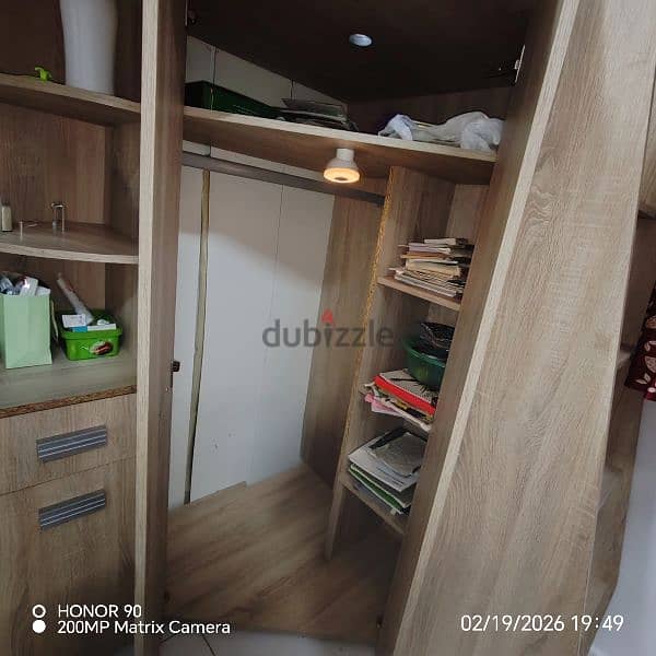 Kids bunk bed with study table and attached wardrobe 1