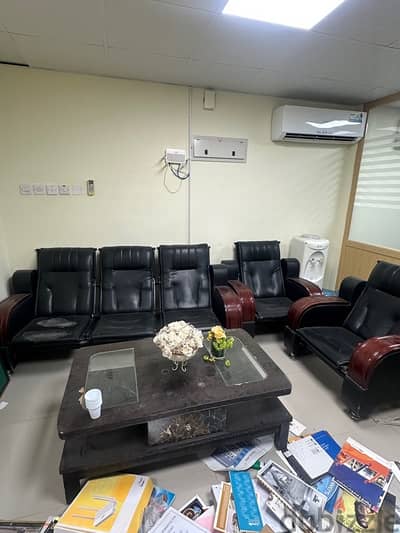 5 seat leather sofa with table