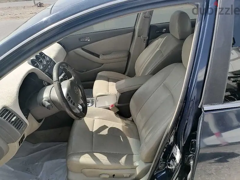 نيسان التيما 200965623551584385121