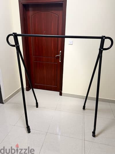 Black Metal Cloth Hanger Stand – Stylish & Space-Saving
