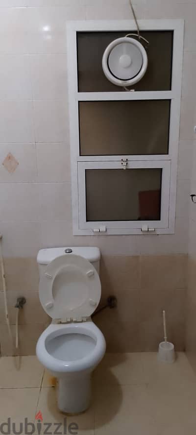 1bed room with shared bathroom and kitchen .