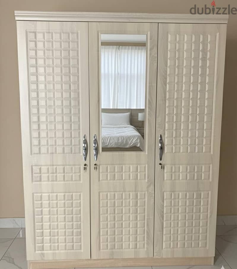 sale of 3 door cabinet 5