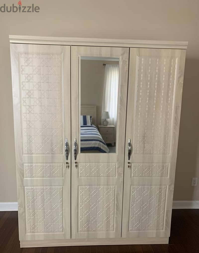 sale of 3 door cabinet 7