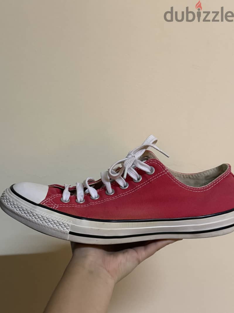 A Red Converse Sneaker 1