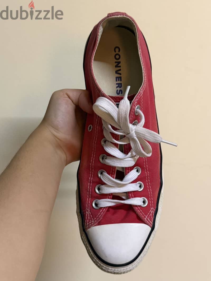 A Red Converse Sneaker 4