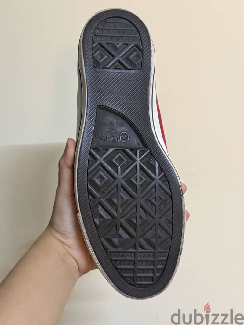 A Red Converse Sneaker 5