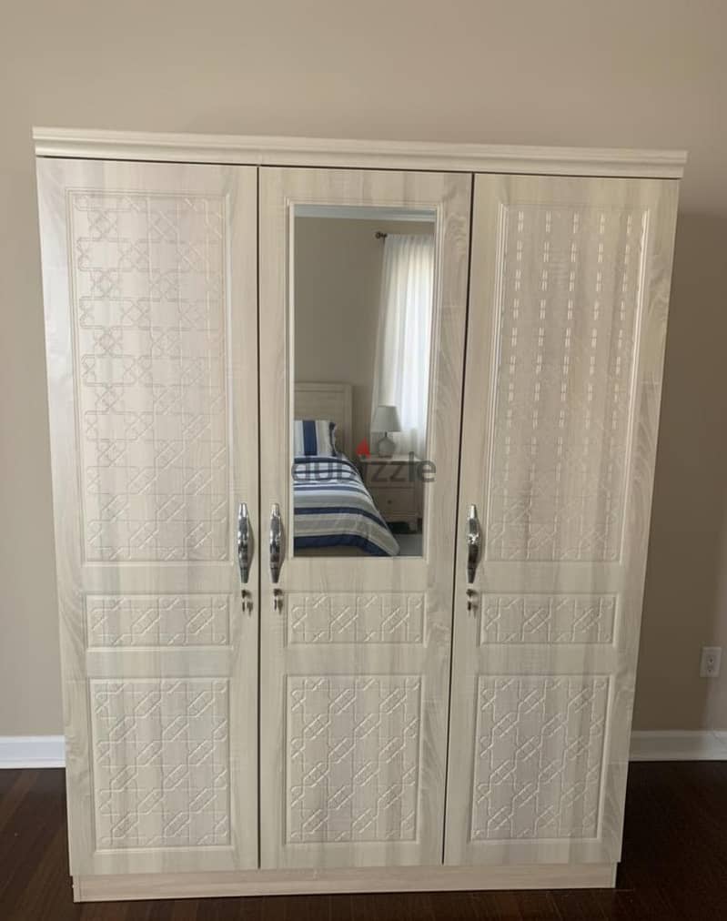 sale of 3 door cabinet 4