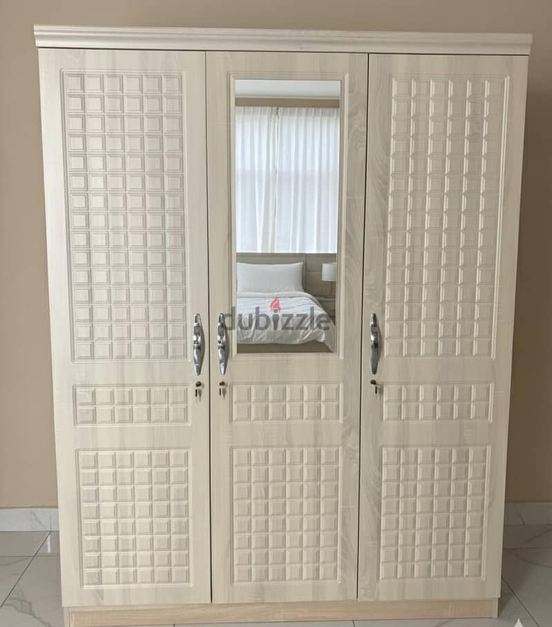 sale of 3 door cabinet 5