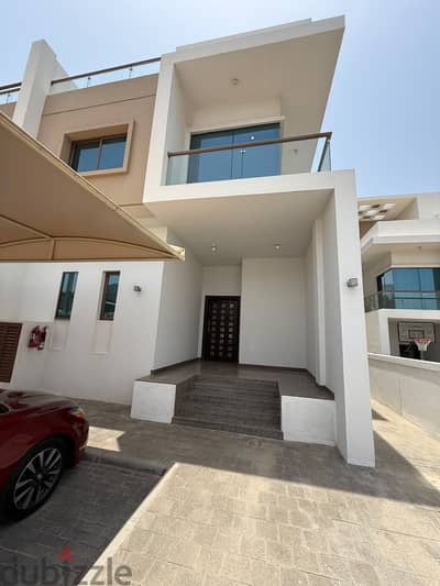 A luxury villa in Media City, located in an upscale residential complex.