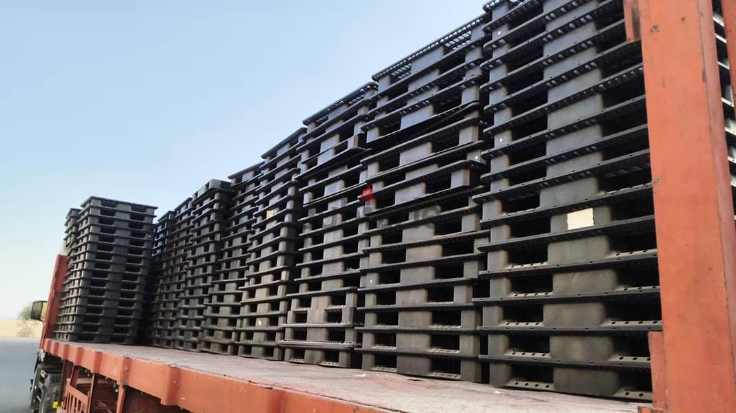 plastic and wooden pallet. drum. ibc tank 7