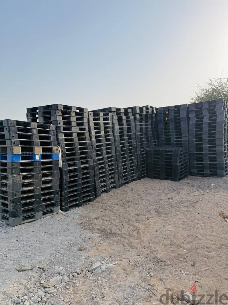 plastic and wooden pallet. drum. ibc tank 16