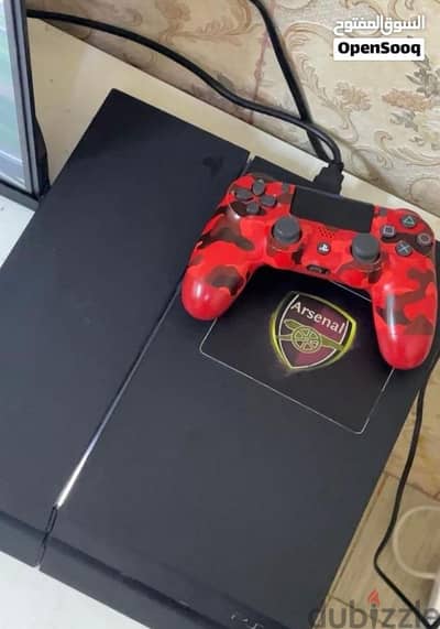 Playstation 4  with controller and cables message me WhatsApp