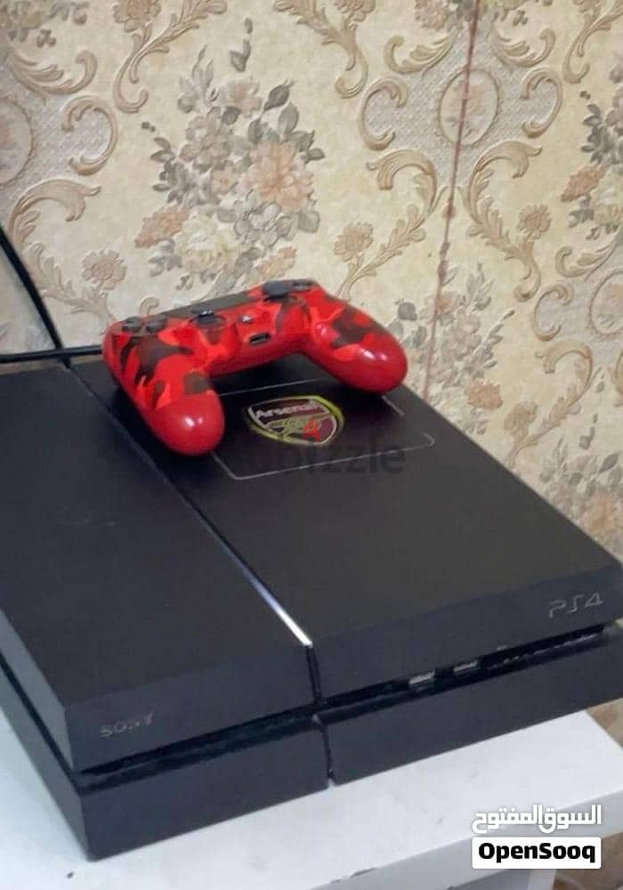 Playstation 4  with controller and cables message me WhatsApp 1